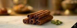 Cinnamon sticks with green cardamom pods — cinnamon cardamom pairing chai garam masala