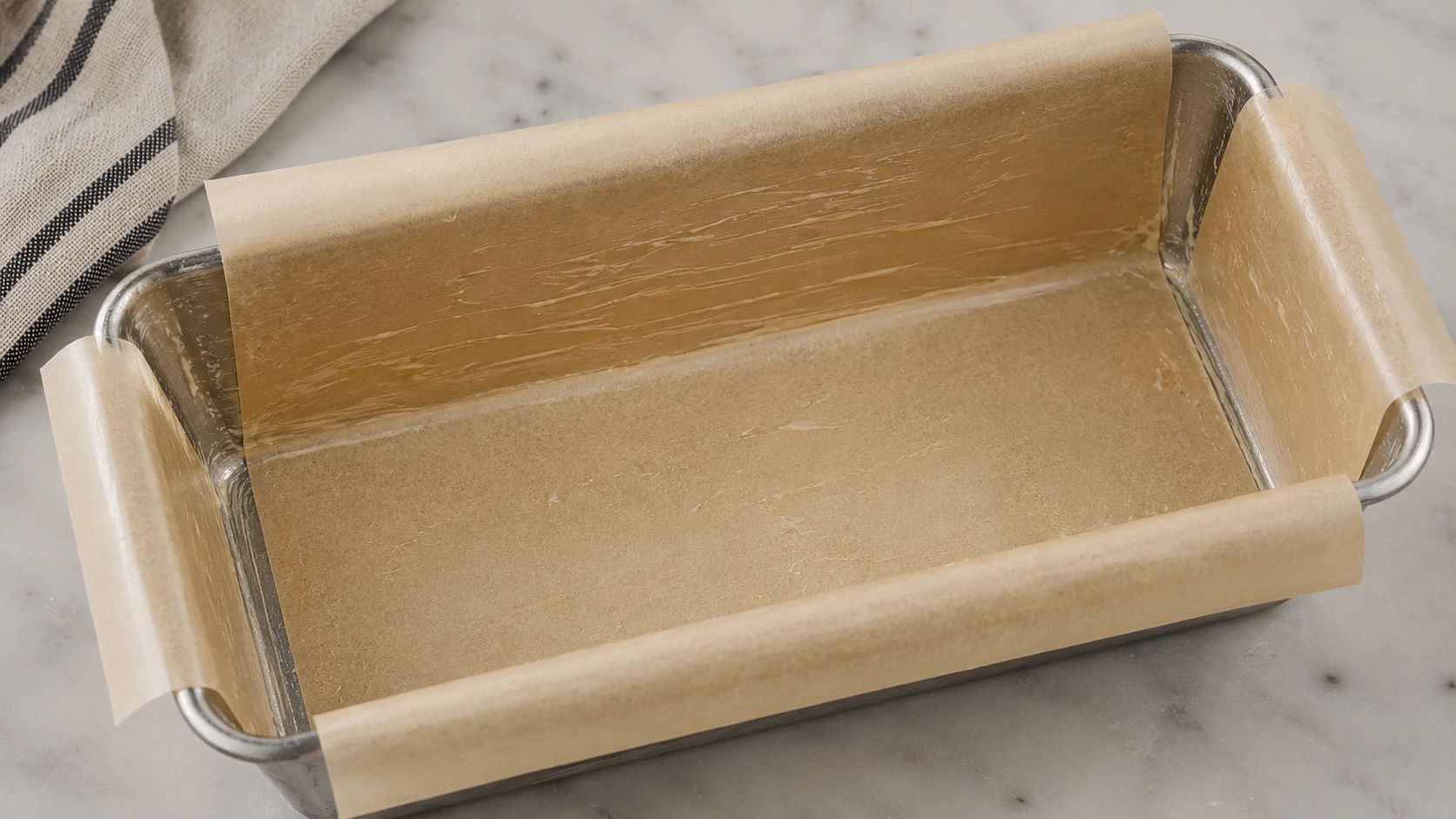 Parchment-lined greased loaf pan